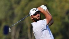 Golfer Jon Rahm celebrates victory
